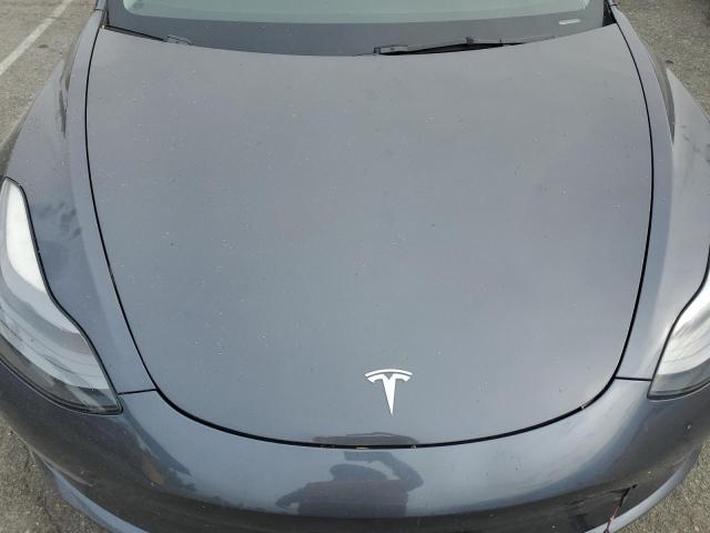 Photo 11 from auction – 2022 TESLA MODEL 3 with VIN 5YJ3E1EC6NF164580