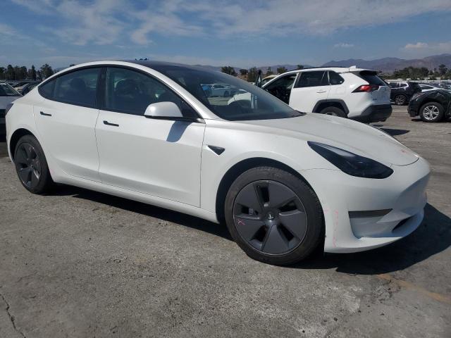 Photo 4 from auction – 2021 TESLA MODEL 3 with VIN 5YJ3E1EAXMF068870