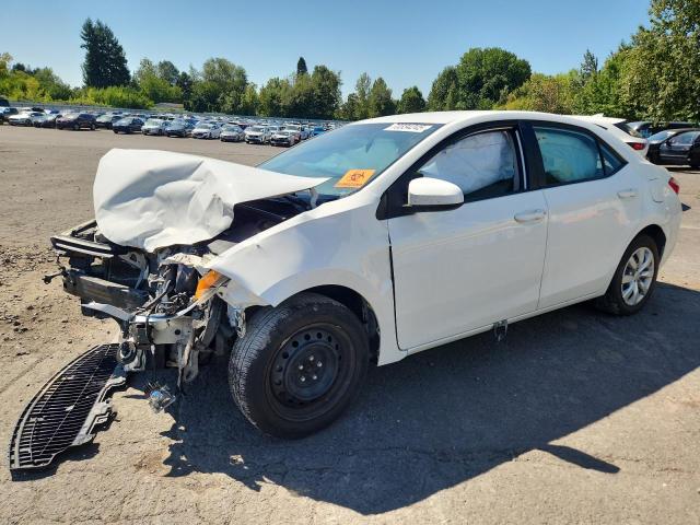 TOYOTA COROLLA L 2014 with VIN 5YFBURHE7EP077897 - Photo from auction