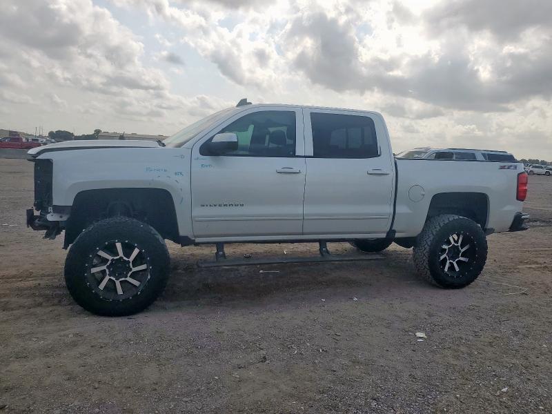 CHEVROLET SILVERADO 2017 with VIN 3GCUKREC0HG134615 - Photo from auction