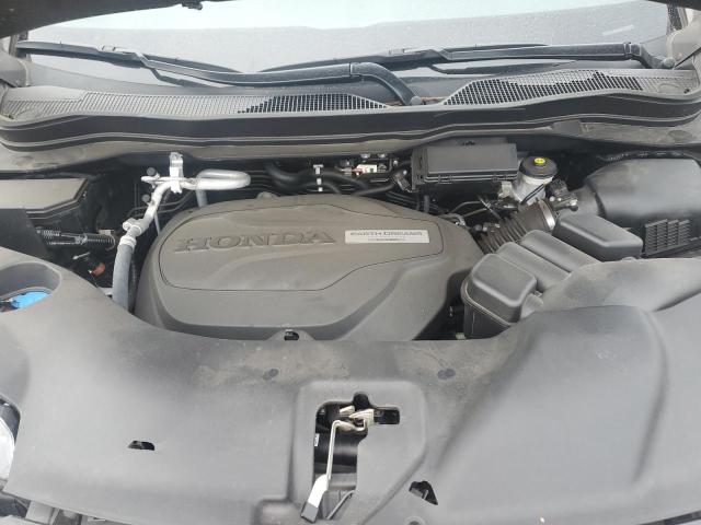 Photo 12 from auction – 2020 HONDA PASSPORT E with VIN 5FNYF7H54LB000258