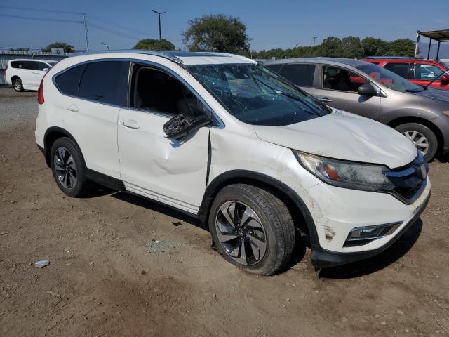 Photo 4 from auction – 2015 HONDA CR-V TOURI with VIN 5J6RM3H90FL021562