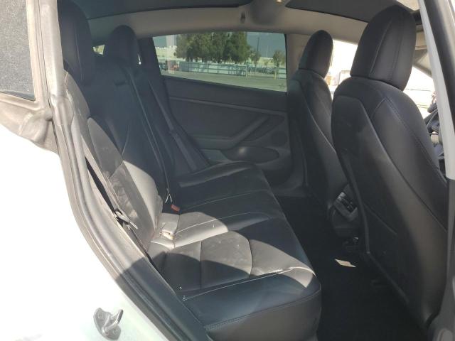 Photo 10 from auction – 2021 TESLA MODEL 3 with VIN 5YJ3E1EA6MF017690
