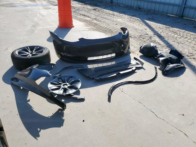 Photo 13 from auction – 2024 TESLA MODEL Y with VIN 7SAYGDED7RA308461