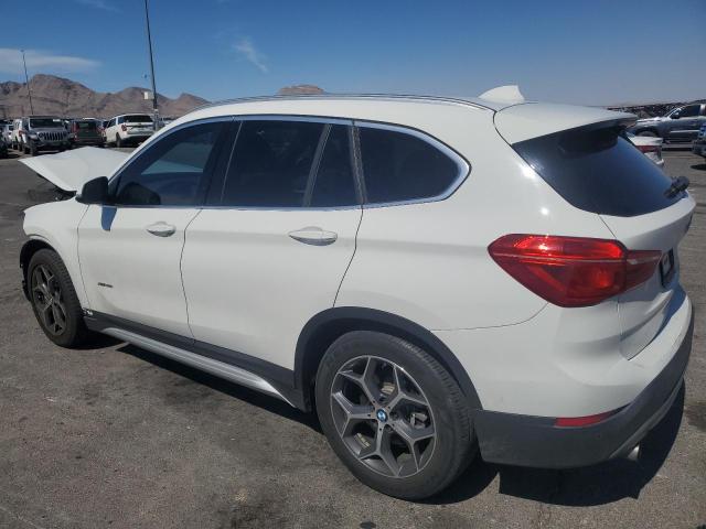 Photo 2 from auction – 2016 BMW X1 XDRIVE2 with VIN WBXHT3C34G5E56605