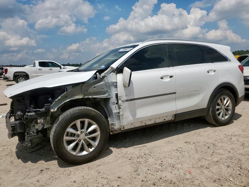 KIA SORENTO LX 2016 with VIN 5XYPG4A39GG090344 - Photo from auction