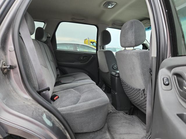 Photo 11 from auction – 2004 MAZDA TRIBUTE LX with VIN 4F2YZ04194KM17333
