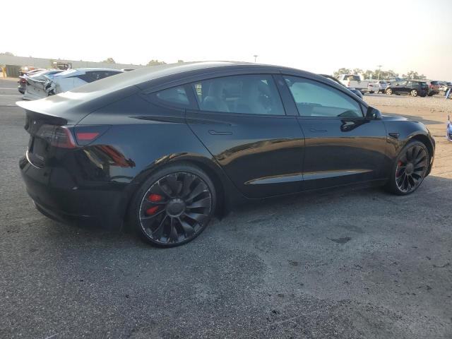 Photo 3 from auction – 2022 TESLA MODEL 3 with VIN 5YJ3E1EC2NF274820
