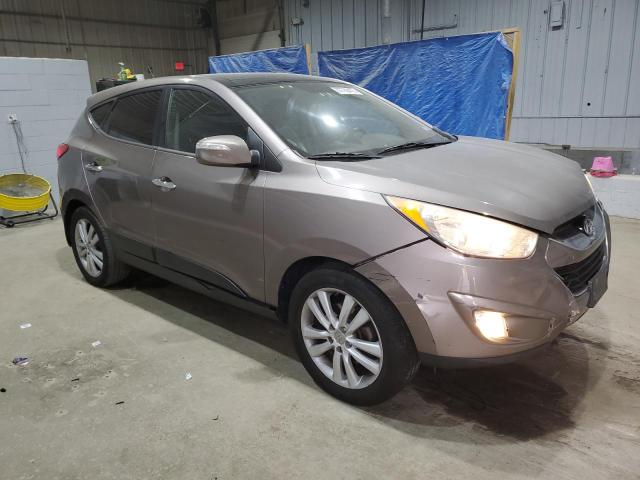 Photo 4 from auction – 2011 HYUNDAI TUCSON GLS with VIN KM8JUCAC0BU195009