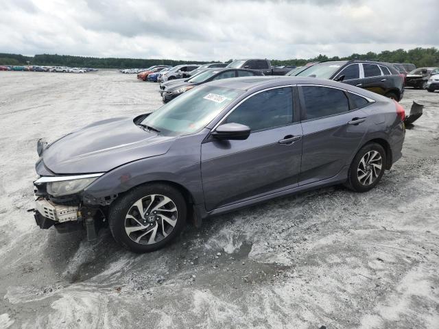 HONDA CIVIC EX 2017 with VIN 19XFC2F79HE004844 - Photo from auction