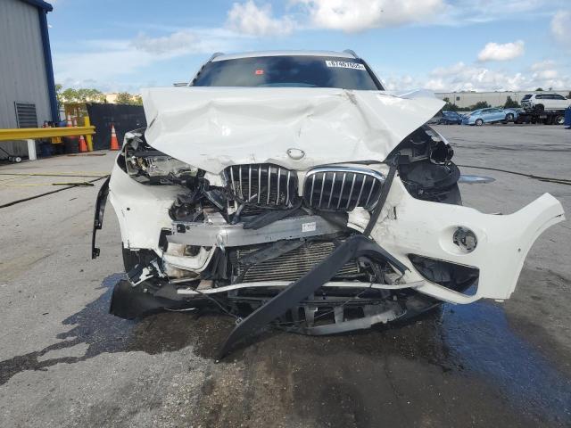 Photo 5 from auction – 2016 BMW X1 XDRIVE2 with VIN WBXHT3C32G5E49989