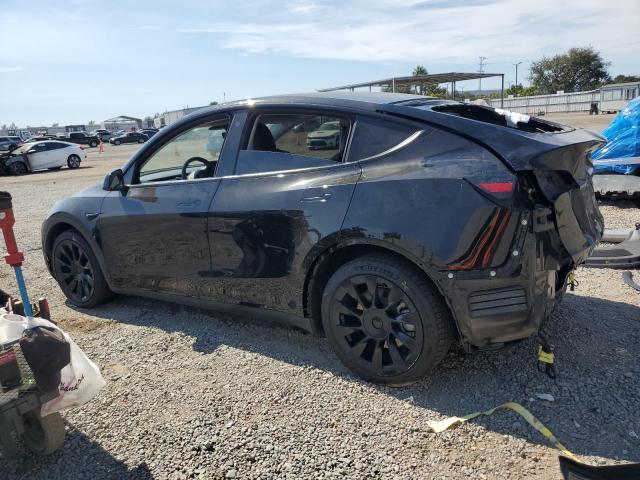 Photo 2 from auction – 2022 TESLA MODEL Y with VIN 7SAYGAEEXNF390934