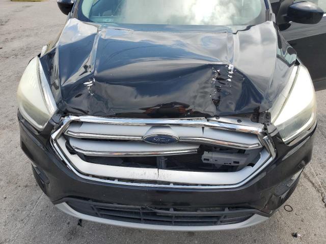 Photo 12 from auction – 2017 FORD ESCAPE SE with VIN 1FMCU0GDXHUD95315