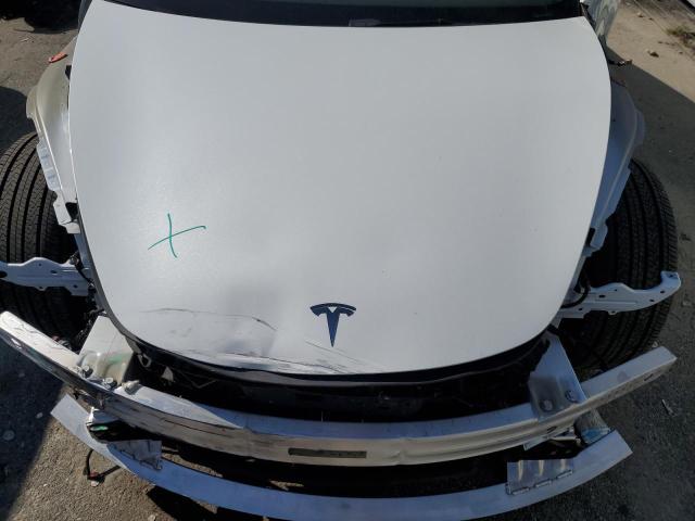 Photo 11 from auction – 2022 TESLA MODEL 3 with VIN 5YJ3E1EBXNF240969
