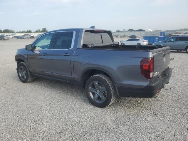 Photo 2 from auction – 2023 HONDA RIDGELINE with VIN 5FPYK3F52PB067624