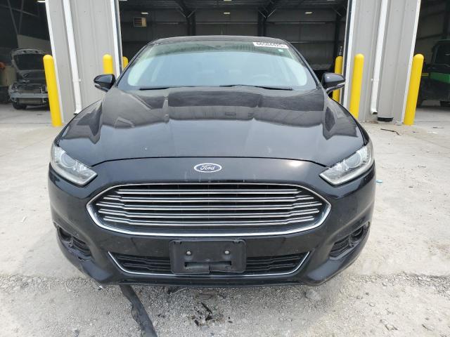 Photo 5 from auction – 2016 FORD FUSION TITANIUM with VIN 3FA6P0K92GR239597