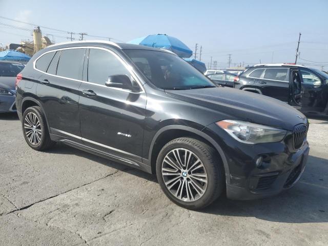 Photo 4 from auction – 2017 BMW X1 SDRIVE2 with VIN WBXHU7C33H5H35422