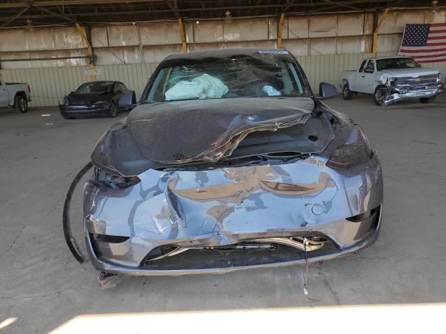 Photo 5 from auction – 2023 TESLA MODEL Y with VIN 7SAYGDEF0PA049584