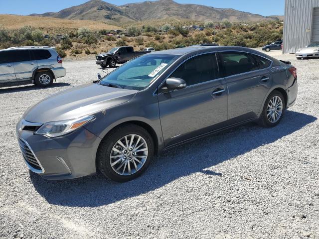 TOYOTA AVALON HYB 2018 with VIN 4T1BD1EB8JU061907 - Photo from auction