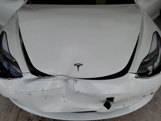 Photo 12 from auction – 2023 TESLA MODEL 3 with VIN 5YJ3E1EA6PF598936