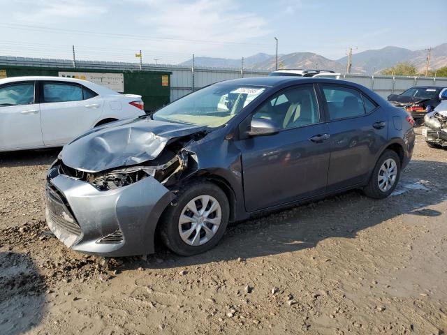 TOYOTA COROLLA LE 2017 with VIN 5YFBPRHE0HP697132 - Photo from auction