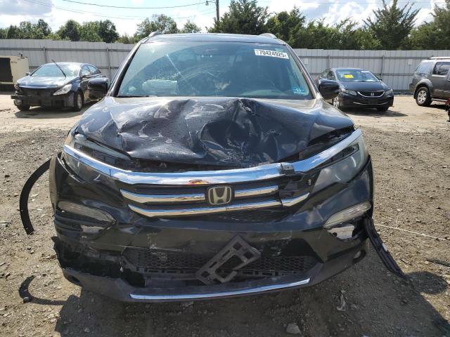 Photo 5 from auction – 2016 HONDA PILOT TOUR with VIN 5FNYF6H95GB020635