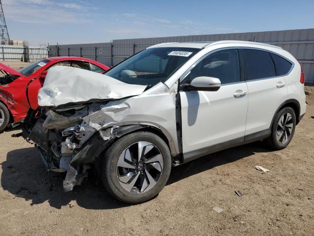 HONDA CR-V TOURI 2016 with VIN 5J6RM3H98GL021696 - Photo from auction