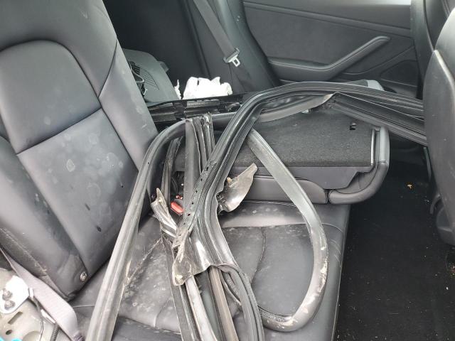 Photo 12 from auction – 2021 TESLA MODEL 3 with VIN 5YJ3E1EAXMF907075