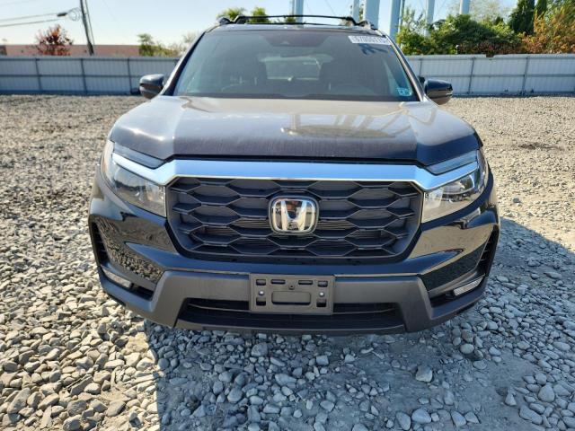 Photo 5 from auction – 2024 HONDA PASSPORT E with VIN 5FNYF8H5XRB013031