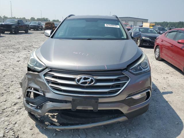 Photo 5 from auction – 2017 HYUNDAI SANTA FE S with VIN 5NMZU3LBXHH031830