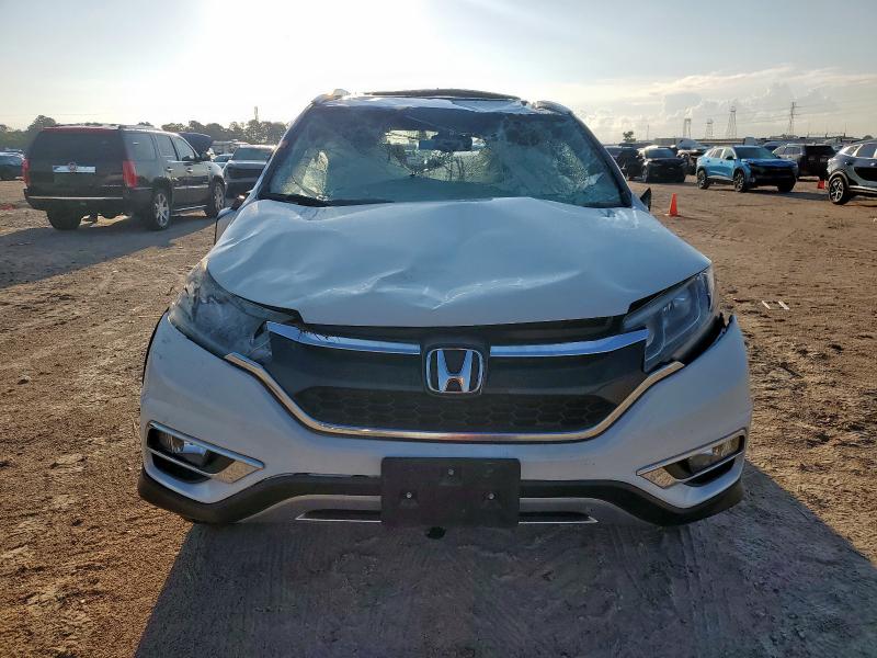 Photo 5 from auction – 2015 HONDA CR-V EXL with VIN 5J6RM4H78FL018400