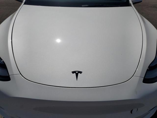 Photo 11 from auction – 2023 TESLA MODEL Y with VIN 7SAYGDEE9PF583113