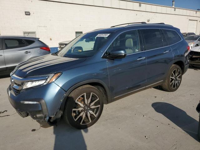 Photo 1 from auction – 2019 HONDA PILOT TOUR with VIN 5FNYF6H66KB094855