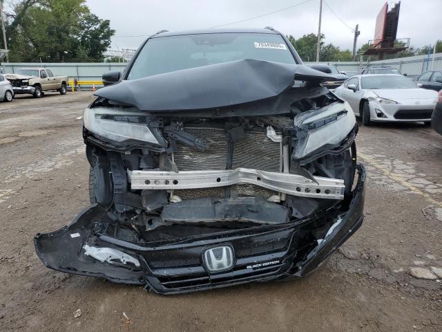 Photo 5 from auction – 2021 HONDA PILOT BLAC with VIN 5FNYF6H79MB017425