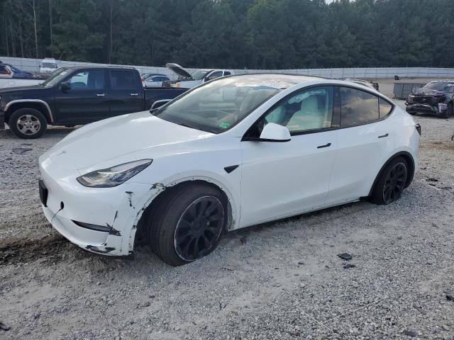 TESLA MODEL Y 2022 with VIN 7SAYGDEE3NF355041 - Photo from auction