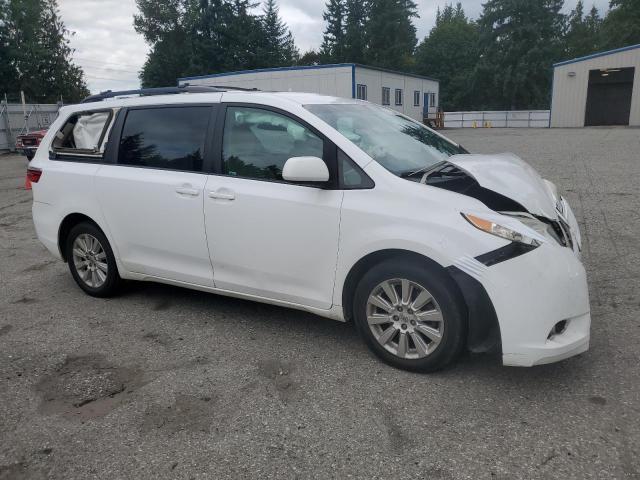 Photo 4 from auction – 2015 TOYOTA SIENNA LE with VIN 5TDJK3DC4FS108731