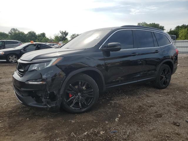 HONDA PILOT SE 2021 with VIN 5FNYF6H26MB099327 - Photo from auction