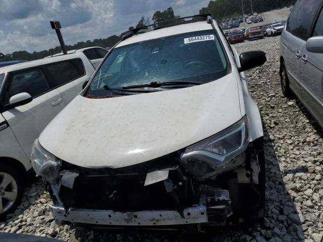 Photo 5 from auction – 2018 TOYOTA RAV4 LE with VIN 2T3BFREV7JW760469