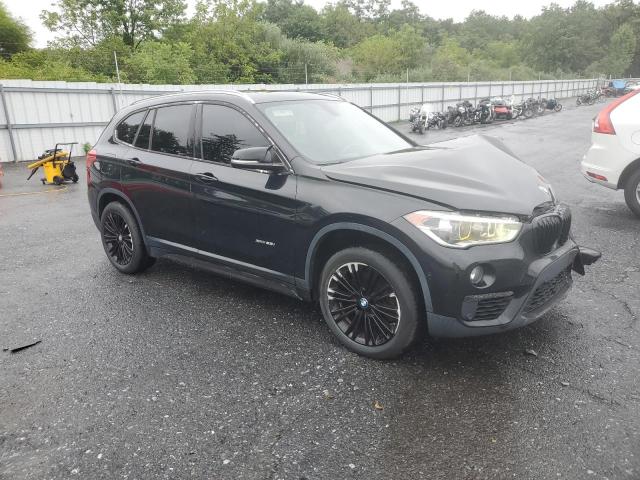 Photo 4 from auction – 2017 BMW X1 XDRIVE2 with VIN WBXHT3Z3XH4A64954