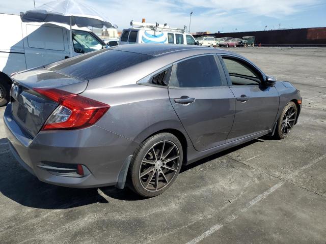 Photo 3 from auction – 2016 HONDA CIVIC LX with VIN 2HGFC2F56GH530965