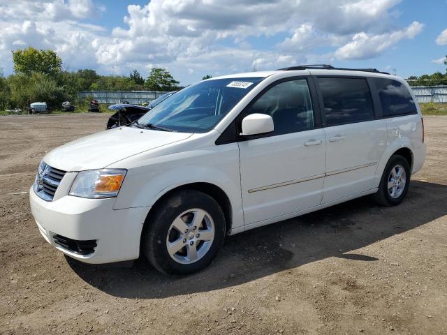 DODGE GRAND CARA 2010 with VIN 2D4RN5D1XAR219423 - Photo from auction