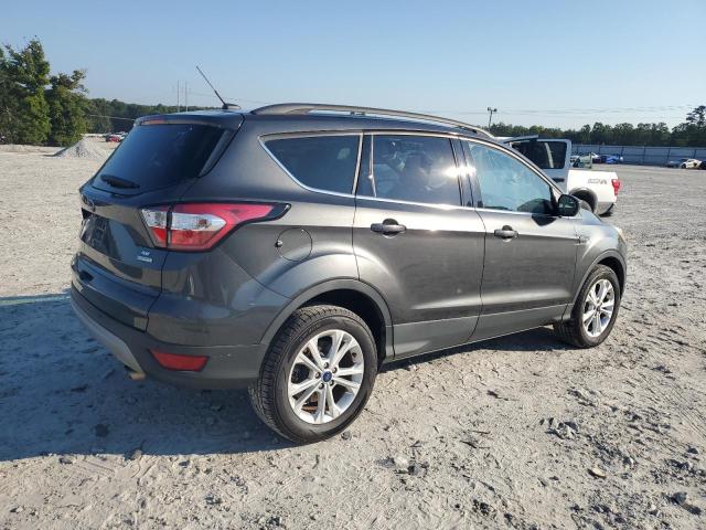 Photo 3 from auction – 2018 FORD ESCAPE SE with VIN 1FMCU0GD4JUC20323
