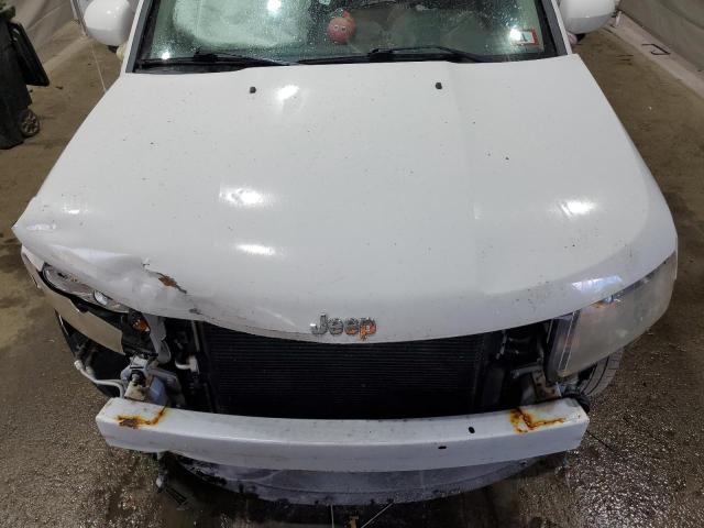 Photo 12 from auction – 2014 JEEP COMPASS LA with VIN 1C4NJDEB7ED761984
