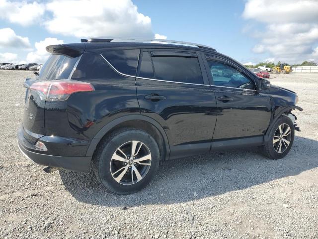 Photo 3 from auction – 2016 TOYOTA RAV4 XLE with VIN 2T3RFREV6GW414212