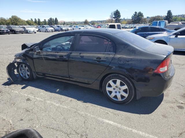 Photo 2 from auction – 2011 HONDA CIVIC LX with VIN 19XFA1F54BE004269