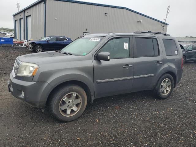 Photo 1 from auction – 2011 HONDA PILOT TOUR with VIN 5FNYF4H97BB055092