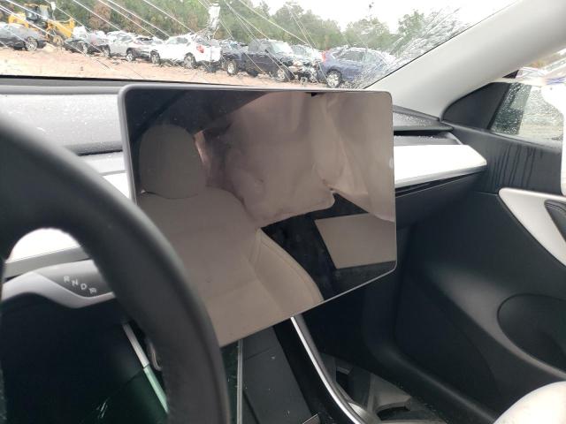Photo 9 from auction – 2021 TESLA MODEL Y with VIN 5YJYGDEE9MF085227