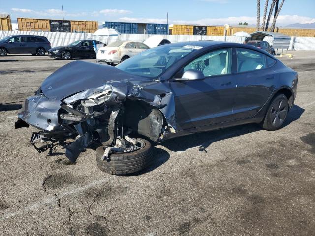 TESLA MODEL 3 2022 with VIN 5YJ3E1EB6NF260328 - Photo from auction