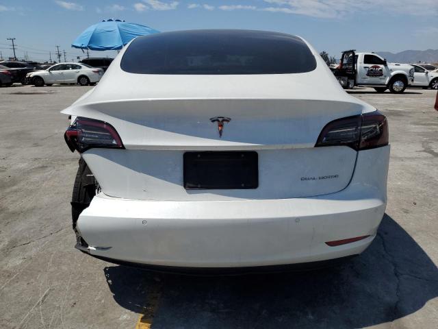 Photo 6 from auction – 2021 TESLA MODEL 3 with VIN 5YJ3E1EB7MF033339