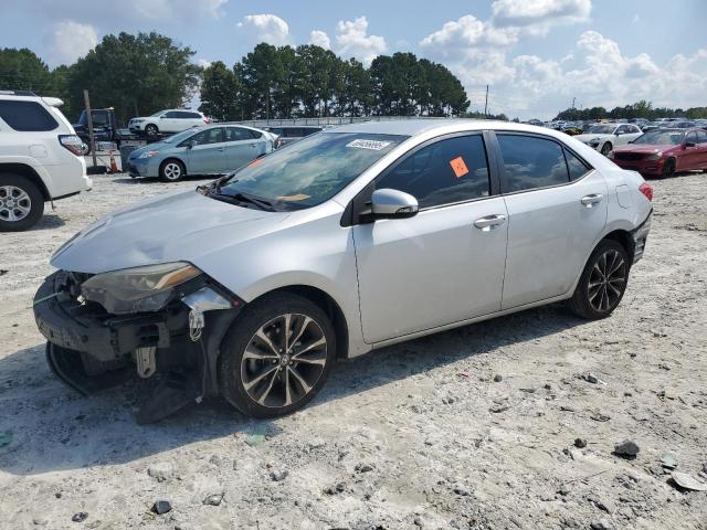 TOYOTA COROLLA L 2018 with VIN 5YFBURHE4JP766547 - Photo from auction